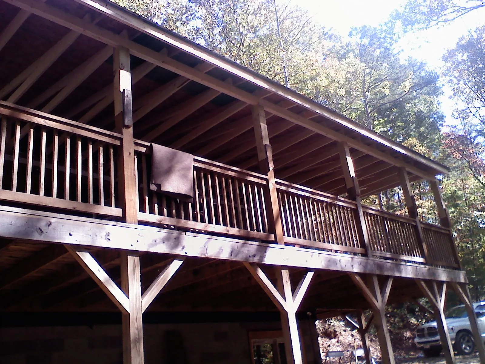 Timber framing under a new elevated porch and deck — Roof Leak Repair in Chippewa Falls by Roofing Brothers